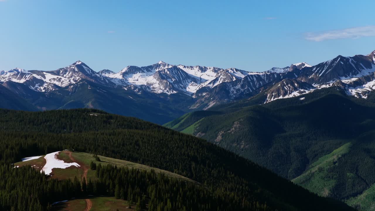 Conundrum Castle Peak AJAX Aspen Mountain Little Annie Basin Trailhead aerial drone Castle Creek melting snow covered Rocky Mountains Ashcroft Spring summer morning sunny blue sky circle right