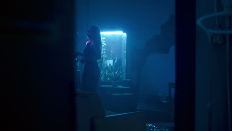 woman dancing in a dimly lit club