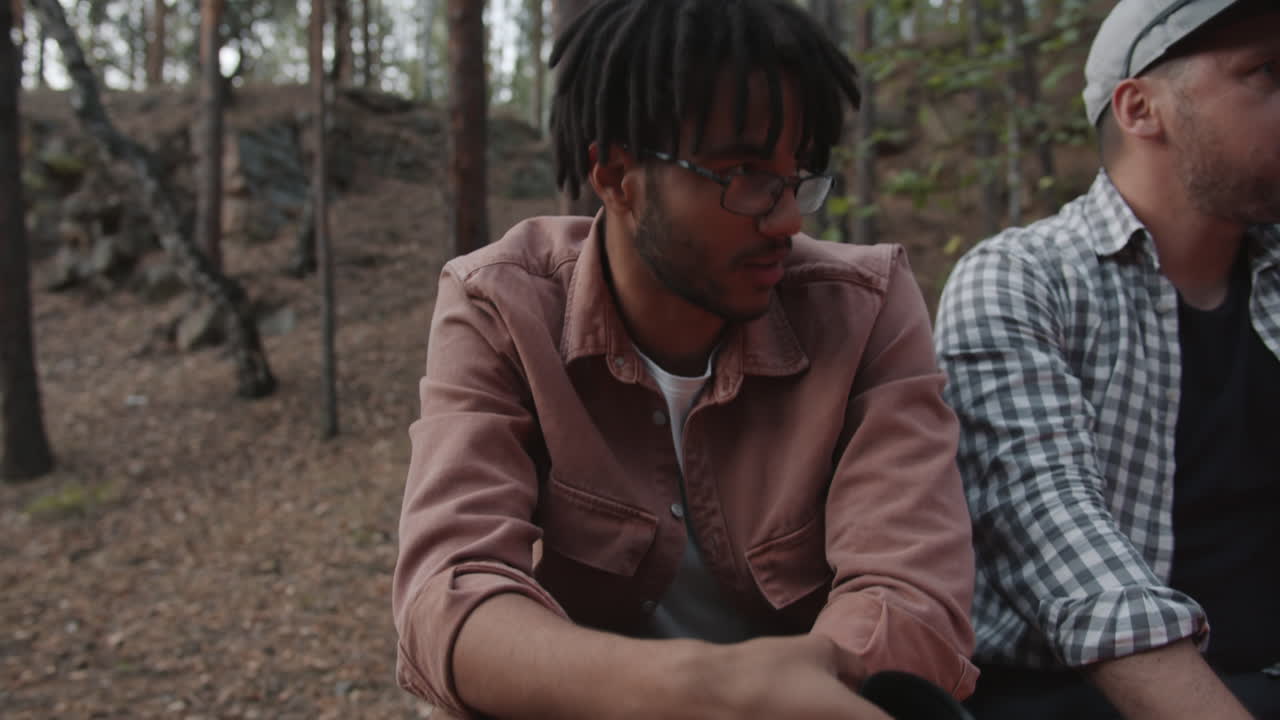 Friends Camping in Forest