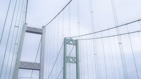 Hyper-lapse-of-the-Tacoma-Narrows-Bridge,-Sunrise,-light-traffic