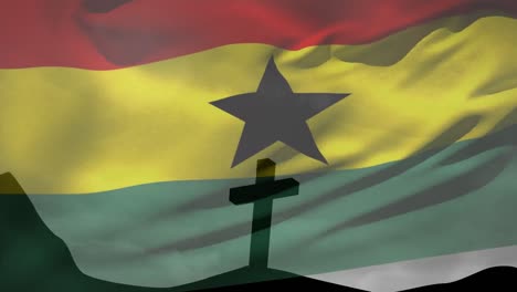 animation of waving ghana flag against silhouette of cross crucifixion on a mountain