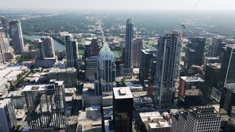aerial view of austin city skyline with skyscrapers and river