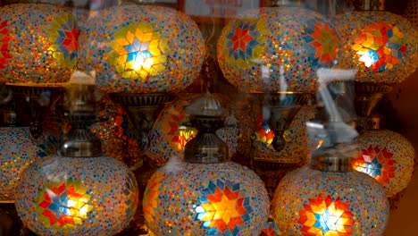 beautiful colorful electric lamps with a traditional pattern in the shop