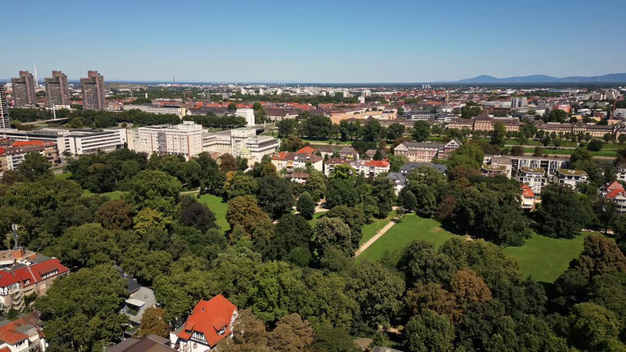 Drone Flight Over Mannheim Oststadt on a Sunny Day – Aerial View of Vibrant Cityscape, Urban Landscape, and Modern Architecture in Bright Weather