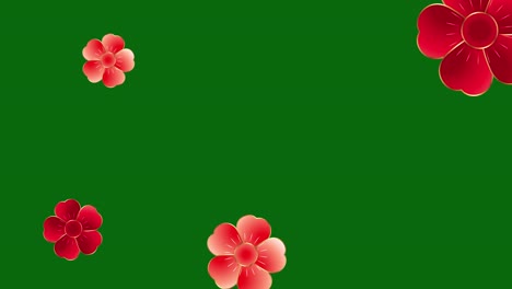 red flowers on green background