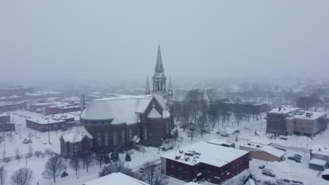 Drone-footage-of-a-church-in-Saint-Jerome,-Canada