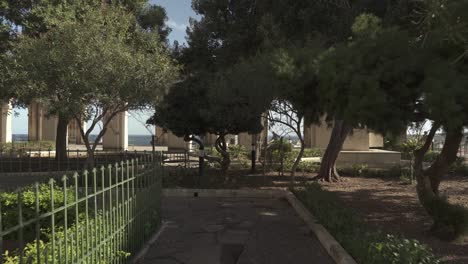 Arcs-of-Lower-Barrakka-Gardens-with-Olive-Trees-at-Valletta,-Malta-on-a-Sunny-Day