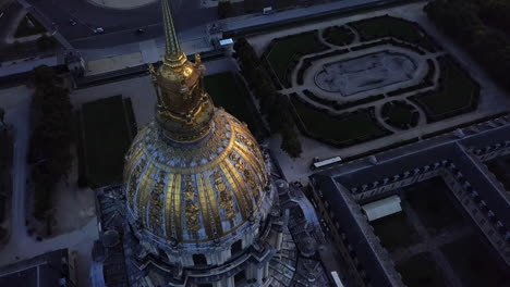 a drone shot looks down on the dome church in paris, france