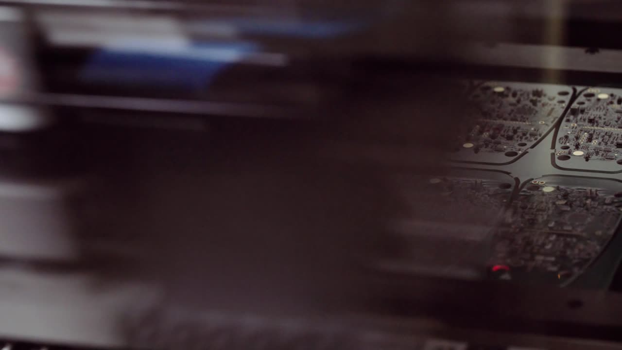 Printed circuit board is assembled by robotic pick and place machine