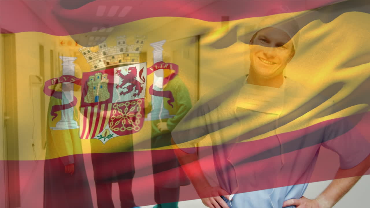 animación de la bandera de españa ondeando sobre un cirujano caucásico sonriente de pie en el pasillo del hospital