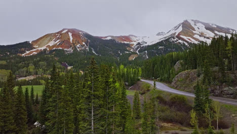 Drone-flyover-of-winding-mountain-road-in-the-mountains