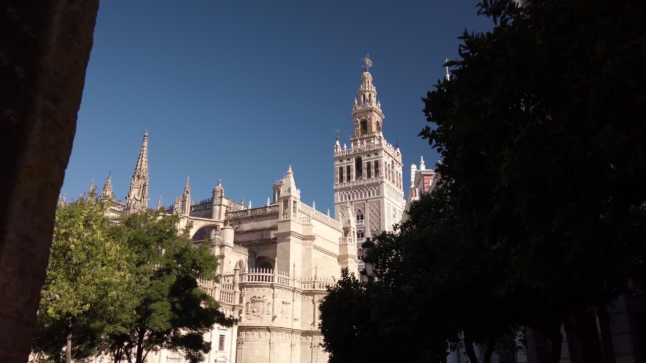 Moving Toward Cathedral and Giralda Tower Through Doorway, Seville, Spain