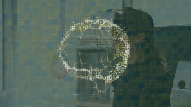 Animation of human brain and medical data processing over businesswoman wearing vr headset