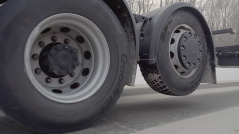 truck and trailer on a snowy road