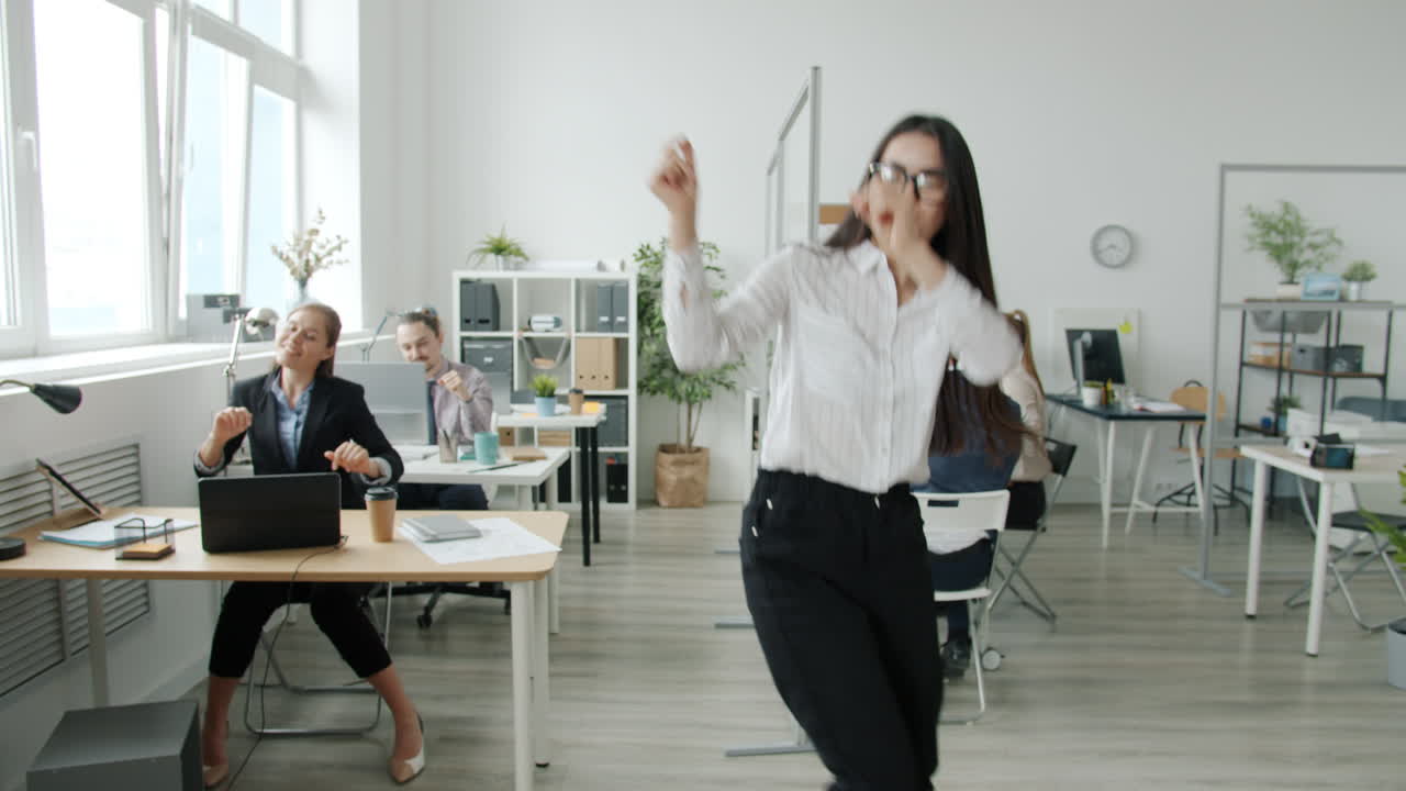 Happy Office Workers Dancing