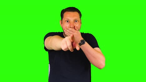 green screen, man pointing at the camera in shock