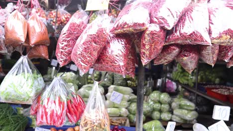 colorful display of vegetables at a busy market