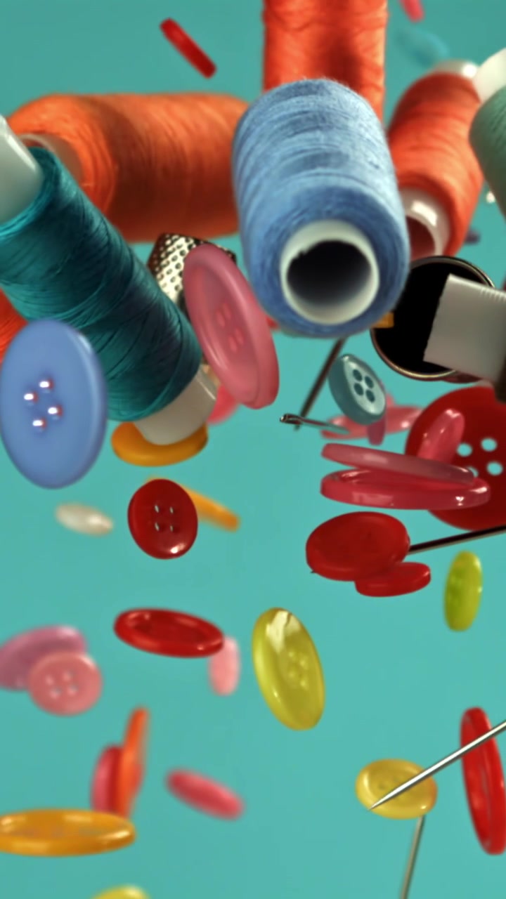 Colorful Sewing Supplies Falling and Floating in Slow Motion