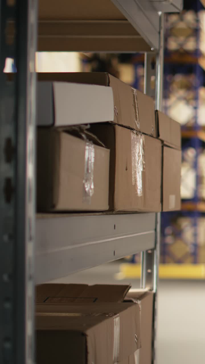 Vertical Video Empty fulfillment center with industrial shelving and storage racks
