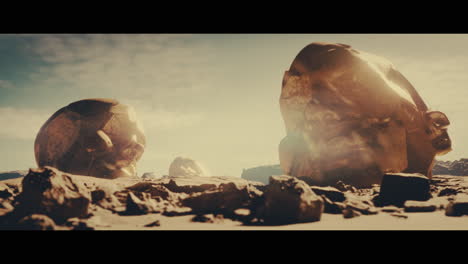 huge golden statues in the desert during sunset