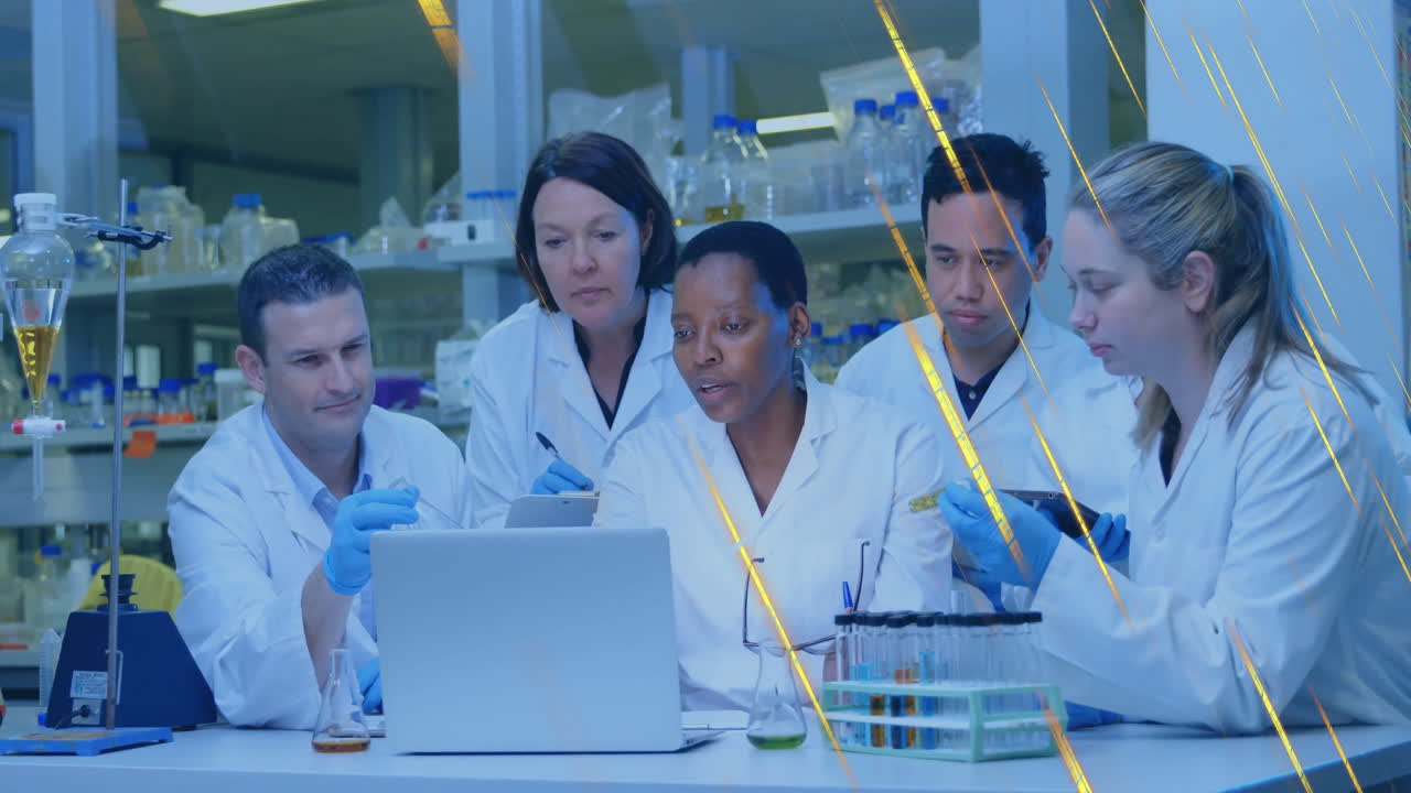 Scientists analyzing research data on laptop in laboratory, showing floating test tube icons