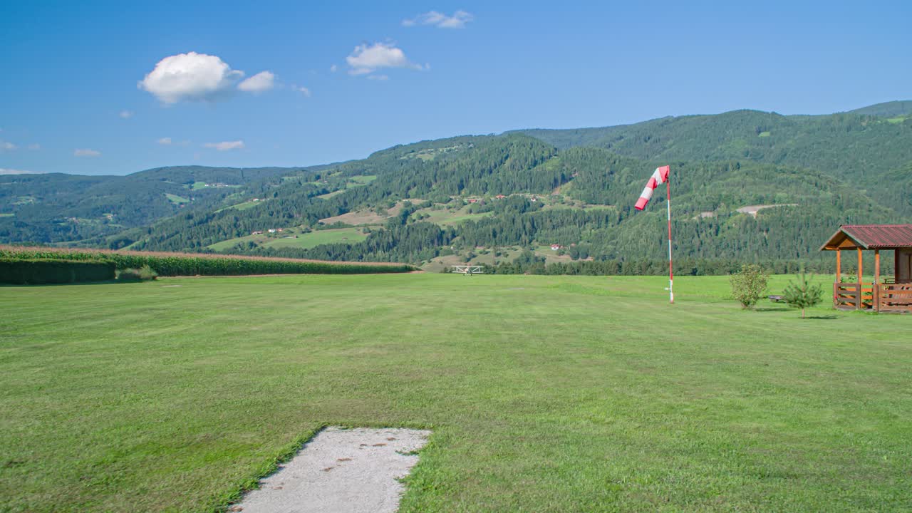 Skydive drop zone in Libelice peak Slovenia, wide shot