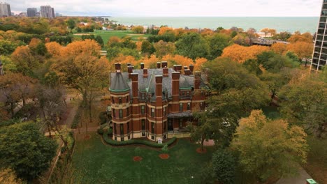 chicago aerial view of mansion in gold coast during autumn