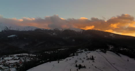 Sunset-At-Mountains-In-Winter-Aerial-View-2