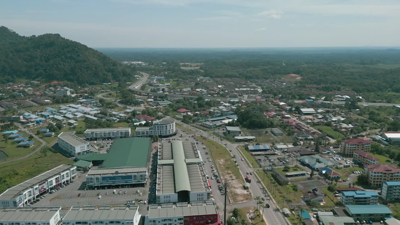 Aerial Drone View, Serian District Town ,Summer With Beautiful Green Trees,New Building And Water Park Lake, Water From The Mountain Sarawak,Borneo.