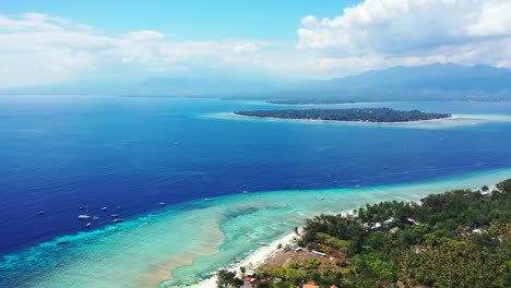 peaceful seaside with tropical islands surrounded by turquoise lagoon under dusty sky with clouds hanging over blue sea, bali