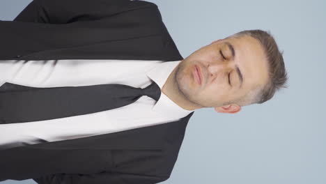vertical video of tired businessman.