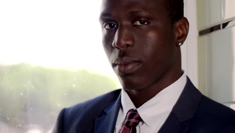 confident charming serious black business man  looking at camera