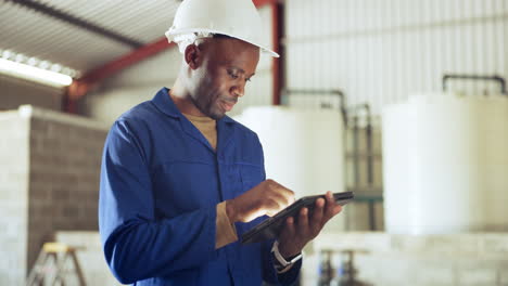 black man, tablet and technician at warehouse