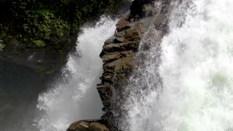 cascading waterfall of nooksack falls in washington state - medium shot