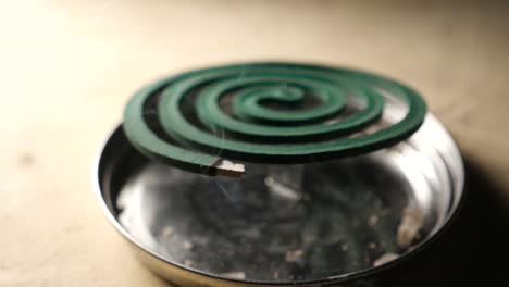 mosquito coil repellent
close up of mosquito coil