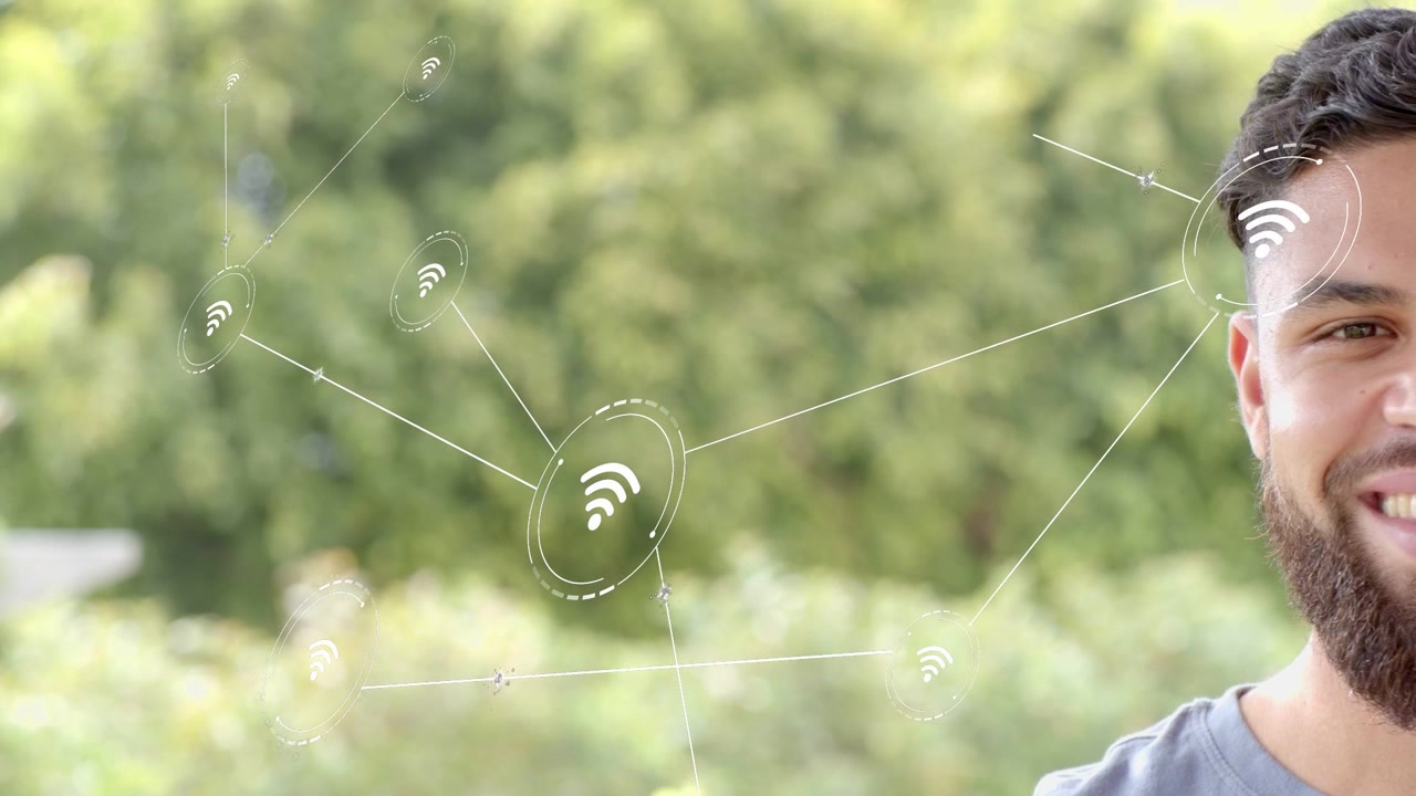 Man smiling as node appears, causing wifi nodes moving inward and overlapping face for tech
