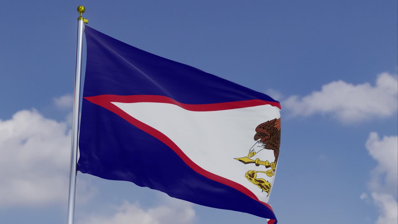 Flag Of American Samoa Moving In The Wind With A Clear Blue Sky In The Background, Clouds Slowly Moving, Flagpole, Slow Motion