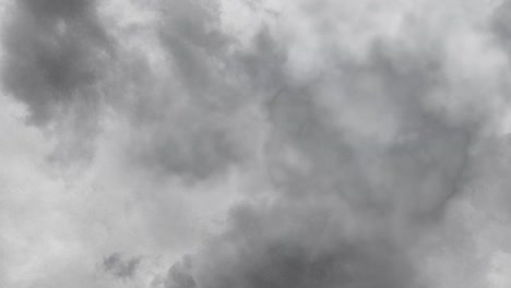 Storm-Clouds-Lightning-Strike-Bolt-at-dark-sky-bakcground