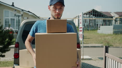 delivery person carrying packages