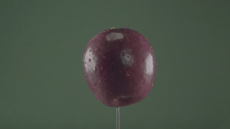 manzana girando con bucle en pantalla verde para la tecla de croma