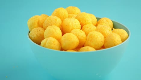 bowl of cheese puffs