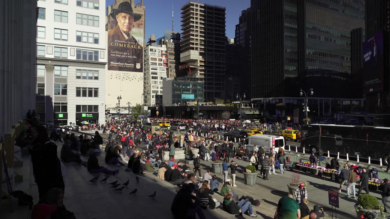 The streets near Madison Square Garden are packed with Trump supporters, energized by the bright sunlight and their shared enthusiasm