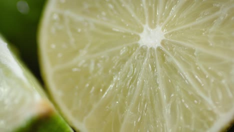 pieces of fresh lime slowly rotating.