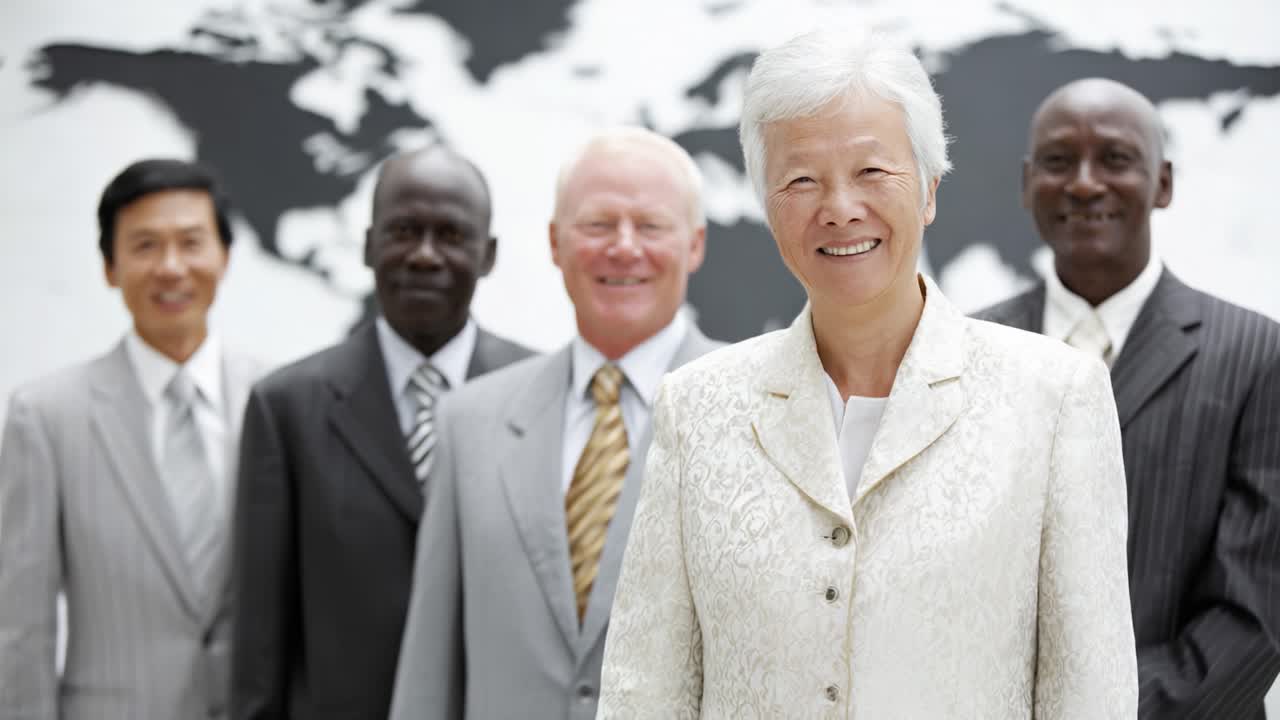 A Diverse Group of Professionals Gathered Together with a Global Map in the Background, Showcasing Unity and Collaboration Across Cultures and Ethnicities