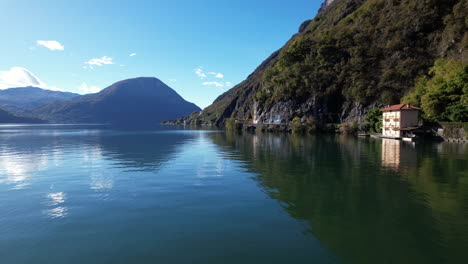 a serene aerial view of como lake with majestic mountains in the background