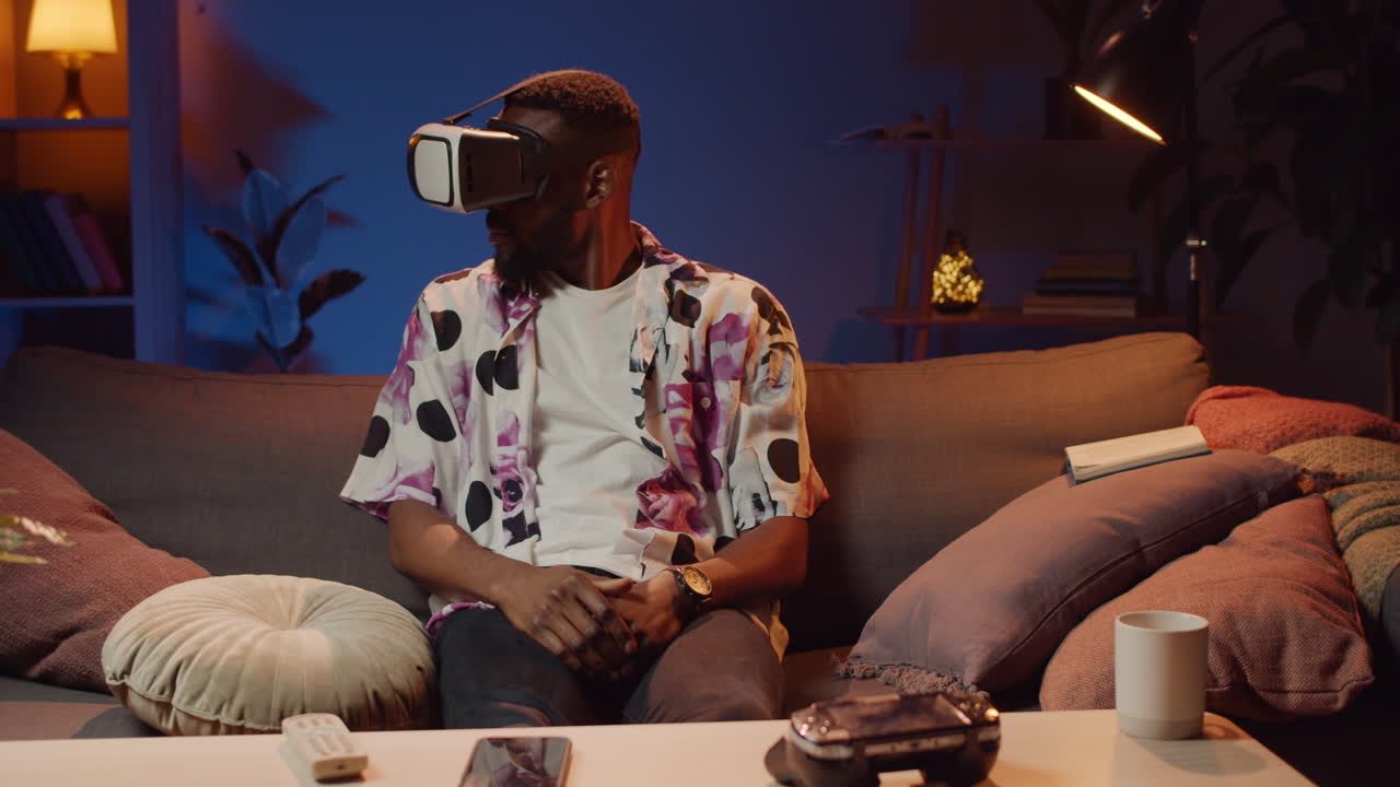 Man using VR headset on couch