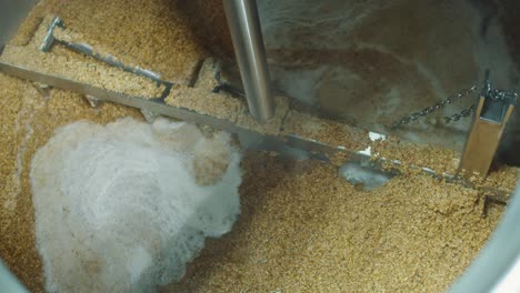 beer mashing process in industrial brewing facility