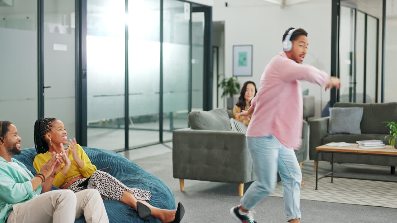 Man dancing, business people applause