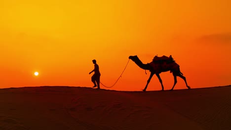 Kameltreiber,-Kameltreiber-Bei-Sonnenuntergang.-Thar-Wüste-Bei-Sonnenuntergang-Jaisalmer,-Rajasthan,-Indien.