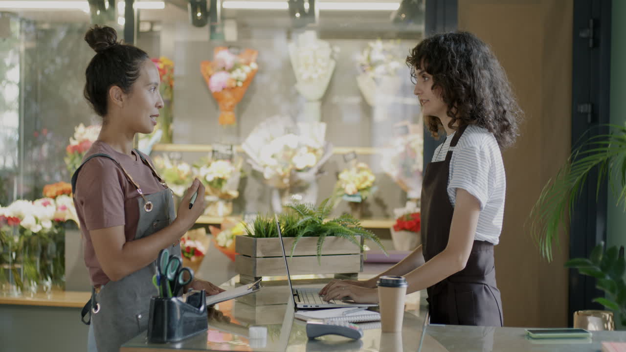 Florist Staff Working at Counter